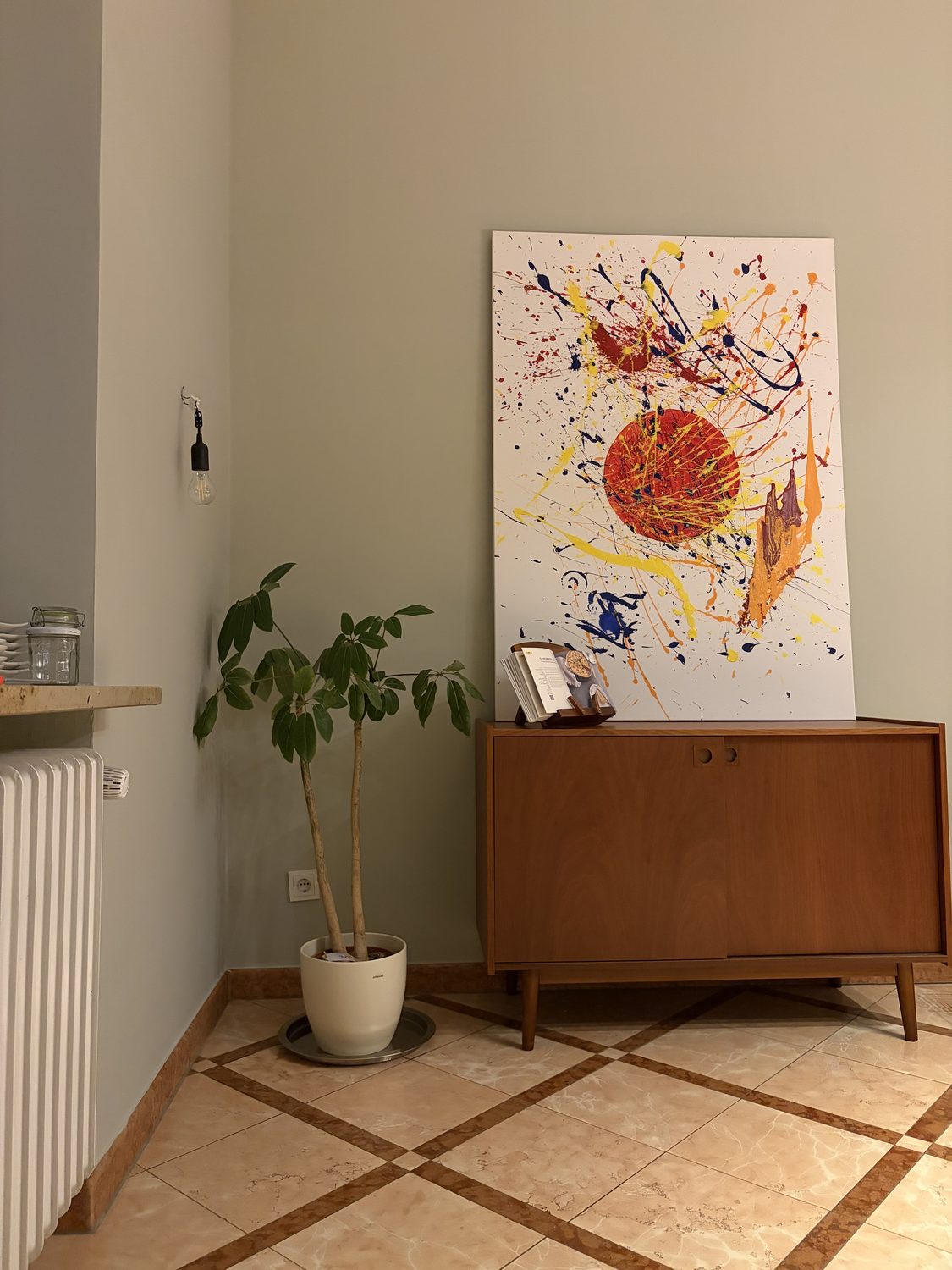 Hérô painting — in the hallway