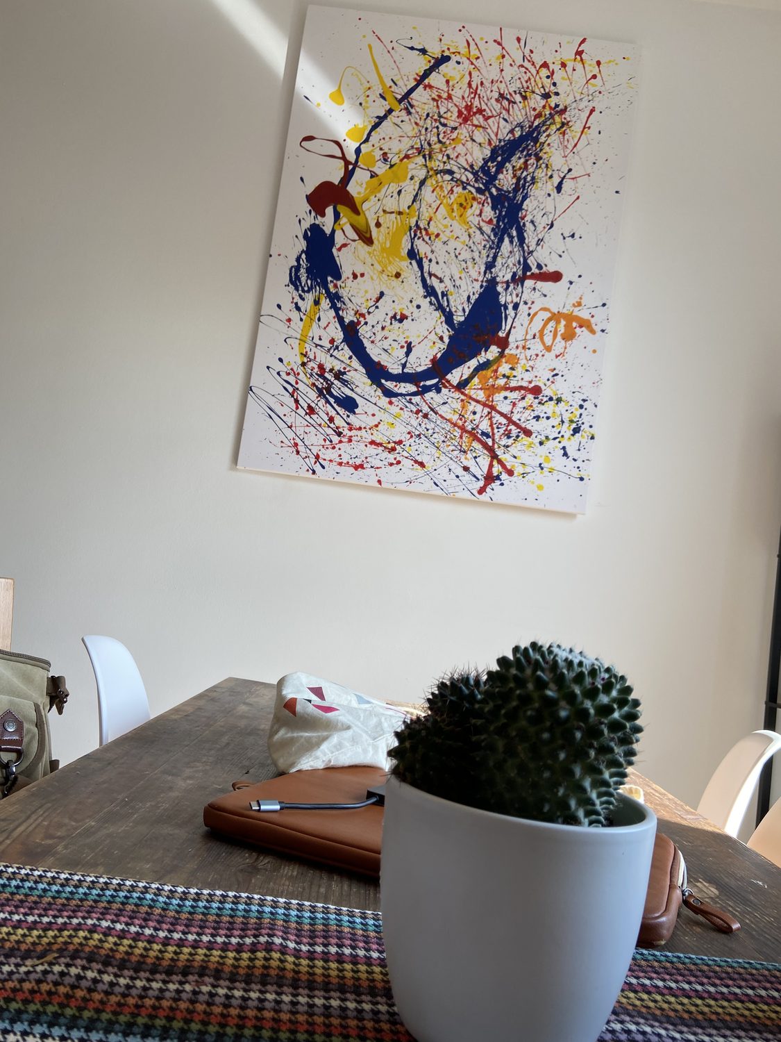 Hérô painting — above the desk